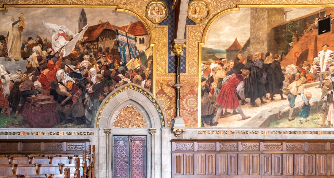 Ausschnitte von zwei Wandgemälden in der Alten Aula der Universität