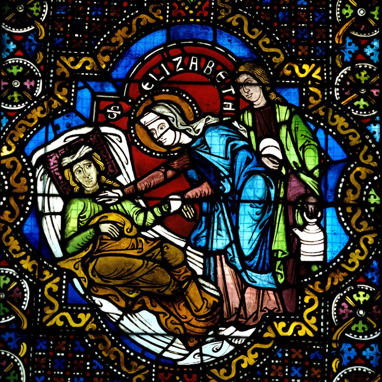Glasmalerei mit der Darstellung der Heiligen Elisabeth von Thüringen bei der Heilung von Kranken