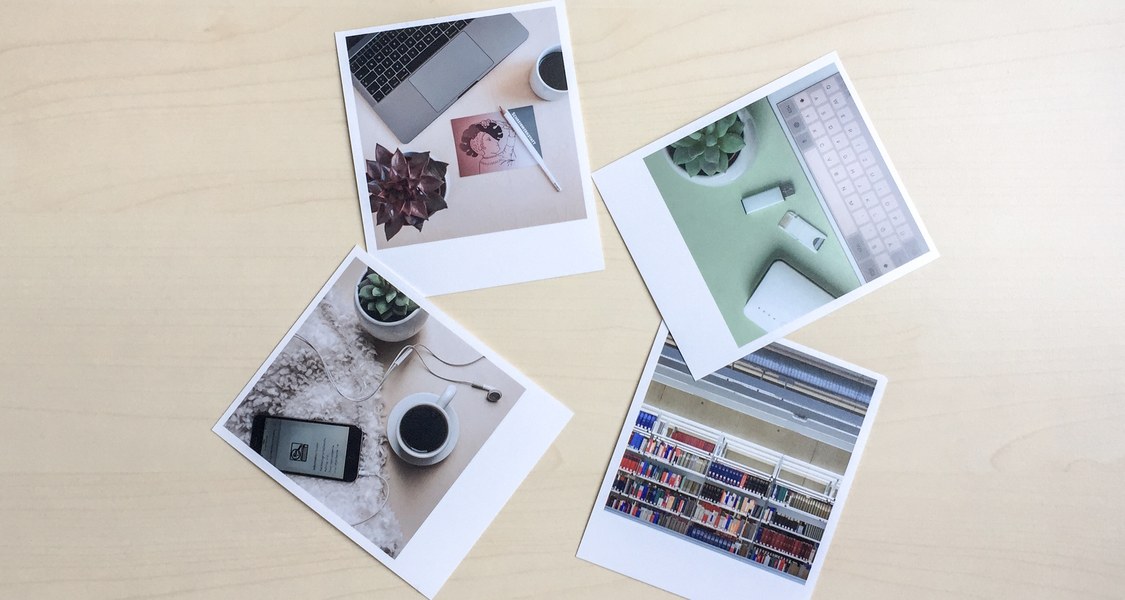 Flatlay aus 4 Polaroids