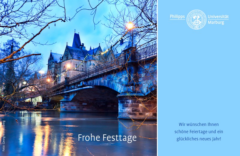 Weihnachtskarte: Blick auf die Weidenhäuser Brücke und die Alte Universität in Marburg.  Text: Frohe Festtage! Wir wünschen Ihnen schöne Feiertage und ein glückliches neues Jahr! (Klick öffnet vergrößerte Ansicht)