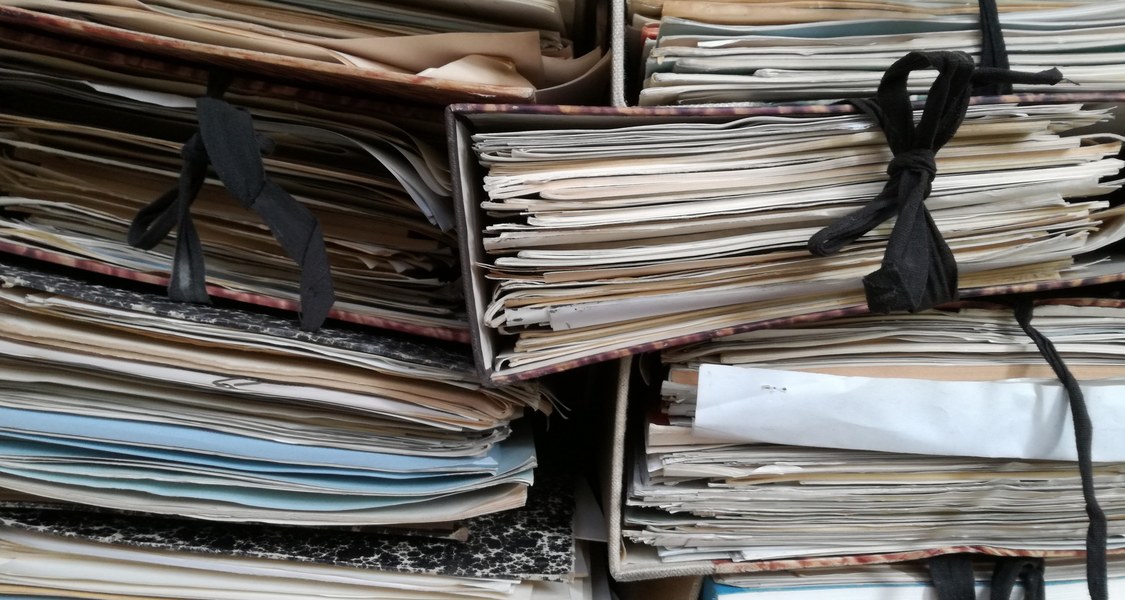 Vintage brown document binders.