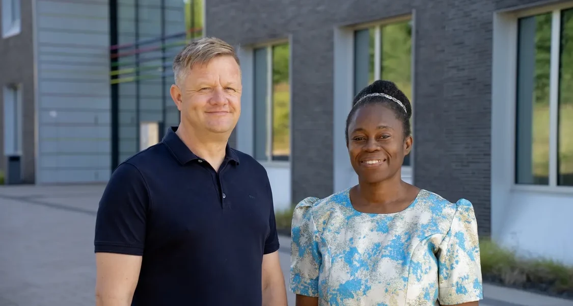 Prof. Dr. Gert Bange, Max Planck Fellow and professor at the University of Marburg, and Dr. Catherine Oluwakemi Esuola from Anchor University in Lagos, Nigeria, in front of the SYNMIKRO building in Marburg, Germany.