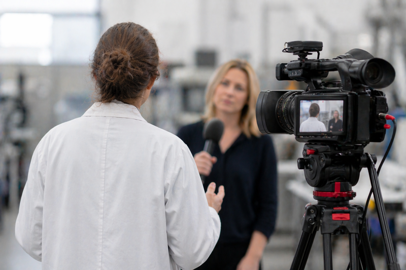 Scientist in fron of a camera