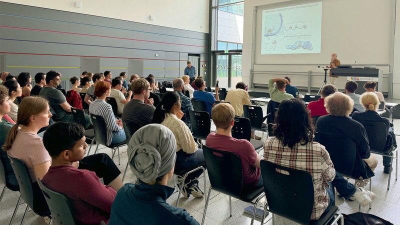Audience listening to talk of Ben Luisi at Summer Symposium 2024 of GRK 2937 in Marburg